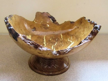 Burr vase on oak stand by Smith Adams